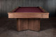 Short wide lifestyle view of the Arthur Deco solid walnut slate billiard table highlighting Art Deco pedestal legs and full table profile by Doc & Holliday Short wide lifestyle view of the Arthur Deco solid walnut slate billiard table highlighting Art Deco pedestal legs and full table profile by Doc & Holliday
